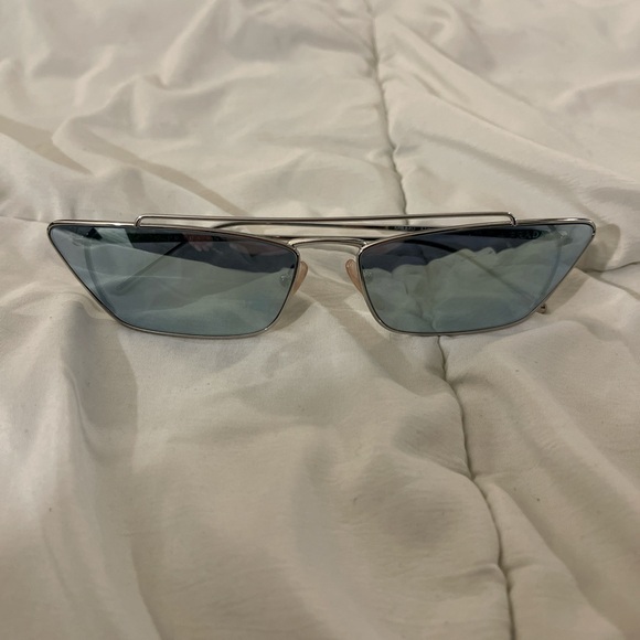 Prada cat eye glasses with reflective lens